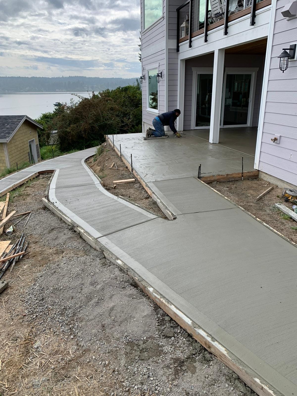 Woking on patio design in Fife, WA, with durable and stylish concrete.